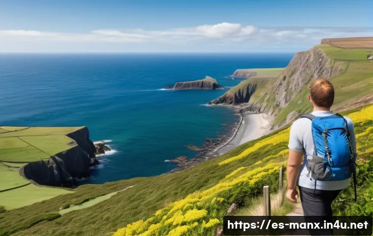 맨섬 vs 건지섬 - A scenic coastal landscape of the Isle of Man featuring rugged cliffs, a winding mountain hiking tra...